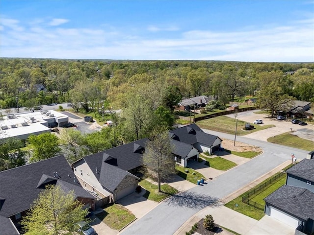 1515/1517 Belle Royal Ct, Bentonville, AR 72712 - aerial perspective of suburban area featuring a heavily wooded area