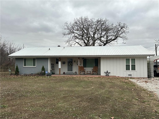 ranch-style house with a front lawn