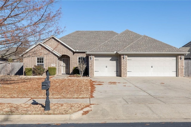 single story home with a garage