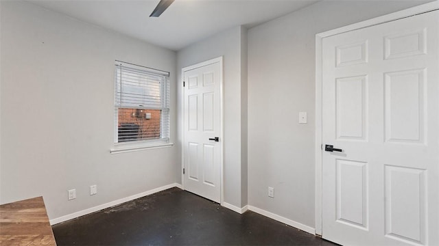 unfurnished bedroom featuring ceiling fan