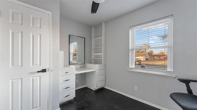 office with ceiling fan and a healthy amount of sunlight