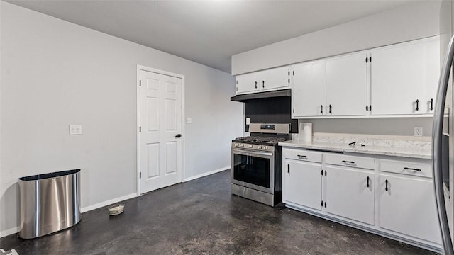 kitchen featuring appliances with stainless steel finishes and white cabinets