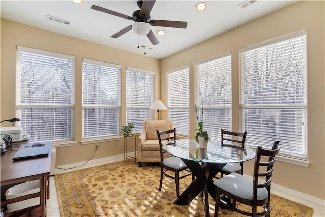 interior space featuring ceiling fan