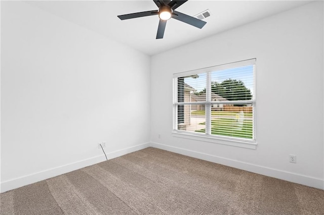 carpeted empty room with ceiling fan