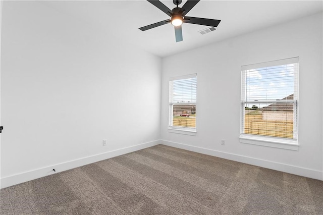 unfurnished room featuring carpet flooring and ceiling fan