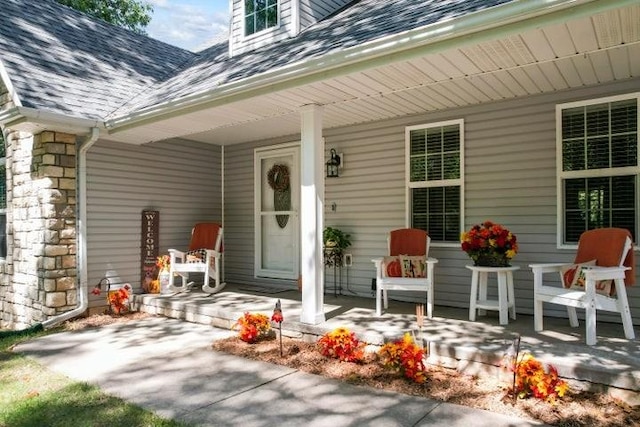 doorway to property featuring covered porch