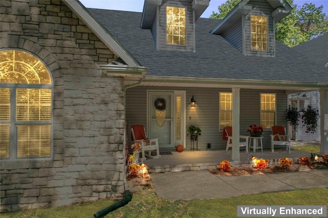 doorway to property with a porch