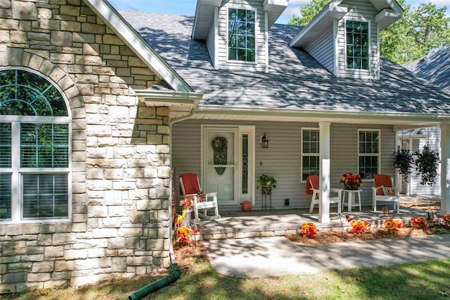 property entrance featuring covered porch