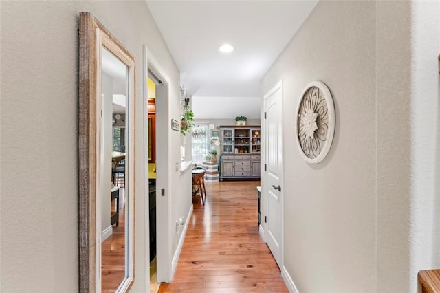 hall featuring light hardwood / wood-style flooring