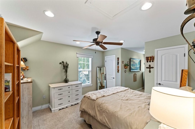 carpeted bedroom with ceiling fan