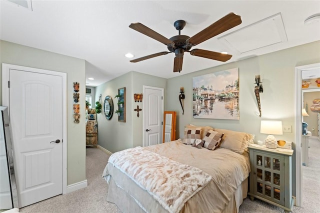 carpeted bedroom featuring ceiling fan