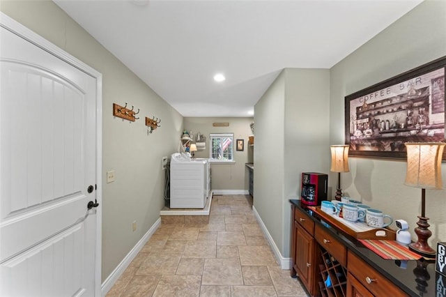 washroom featuring washer and clothes dryer