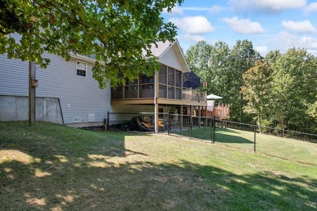 exterior space featuring a sunroom and a yard