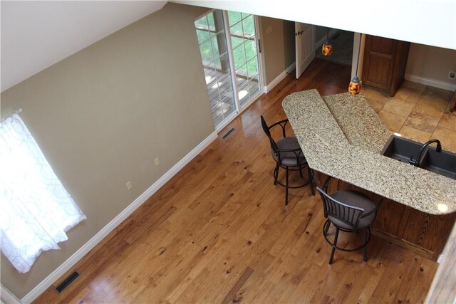 635 Ranchview Rd, Ridgedale, MO 65739 - dining area featuring vaulted ceiling, light wood finished floors, and a desk