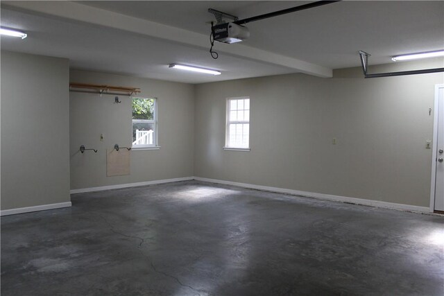 635 Ranchview Rd, Ridgedale, MO 65739 - garage featuring a garage door opener and baseboards