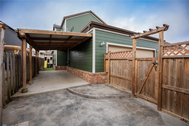 view of home's exterior featuring a carport