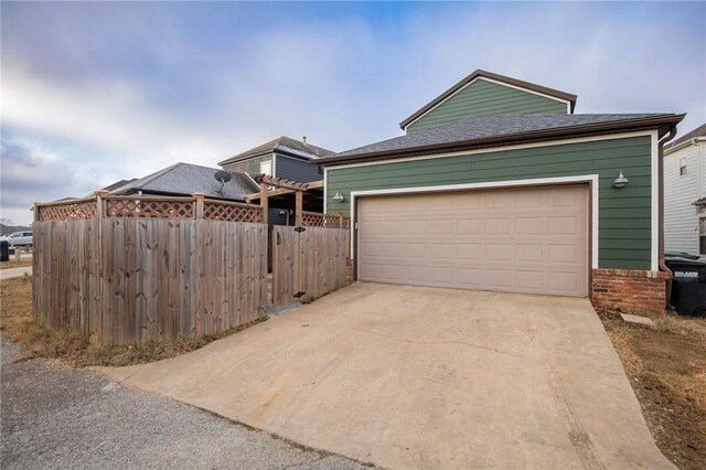 view of front of home with a garage