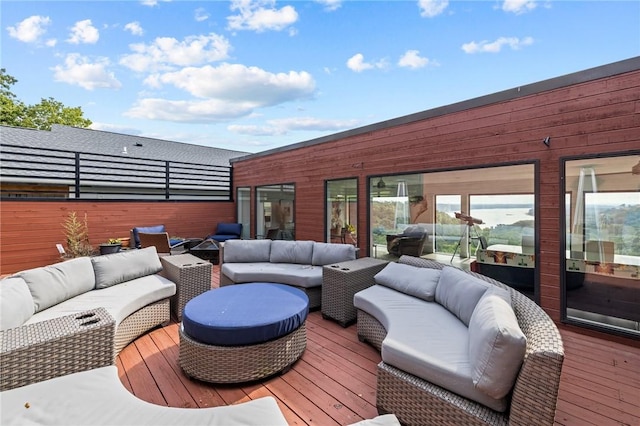 wooden deck featuring an outdoor living space