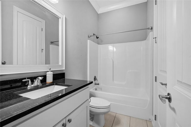 full bathroom with vanity,  shower combination, crown molding, tile patterned flooring, and toilet