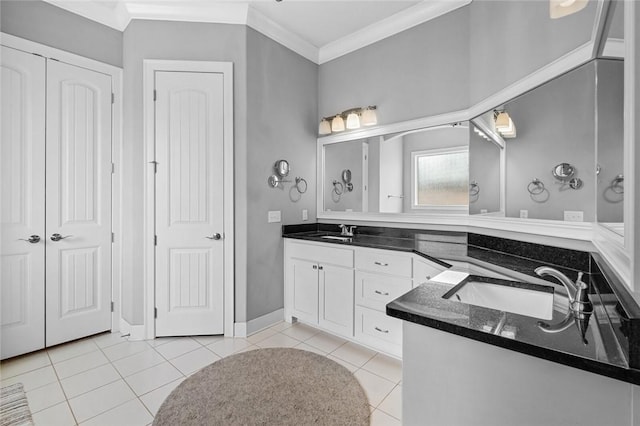 bathroom featuring tile patterned floors, vanity, and ornamental molding