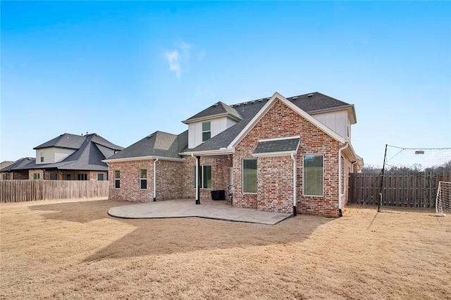 rear view of house with a patio