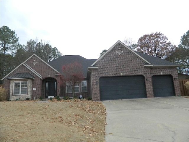 view of front of house with a garage