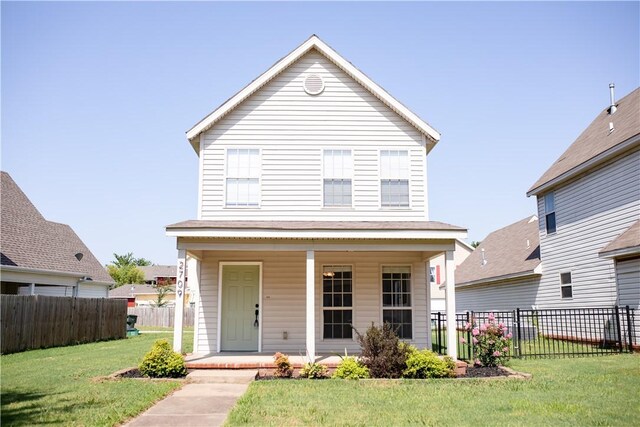 front facade featuring a front yard