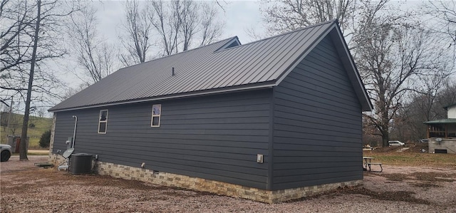 view of home's exterior featuring cooling unit