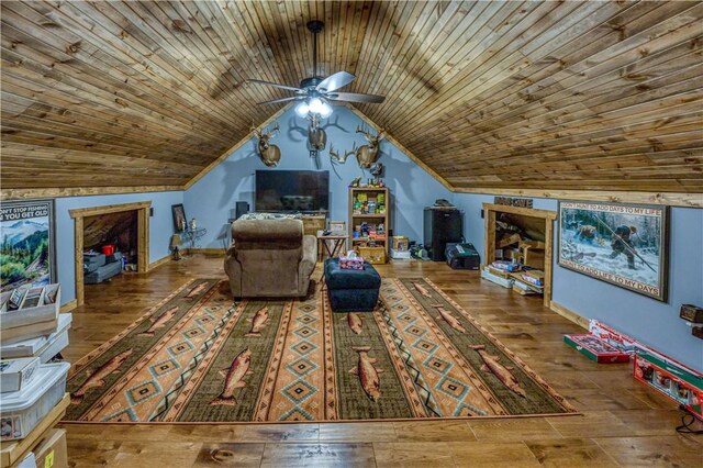 interior space featuring lofted ceiling, ceiling fan, wood ceiling, and hardwood / wood-style floors