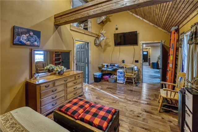 interior space with high vaulted ceiling, beam ceiling, wood ceiling, and hardwood / wood-style floors