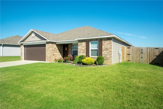 view of front facade with a garage and a front lawn