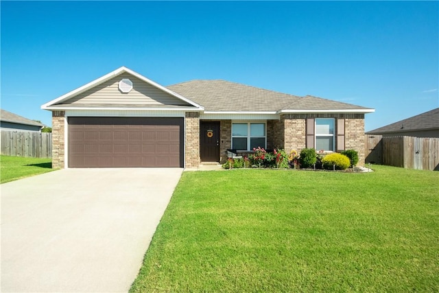 ranch-style home with a front yard and a garage