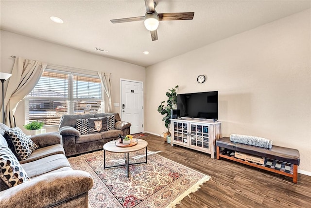 living room with ceiling fan and hardwood / wood-style floors