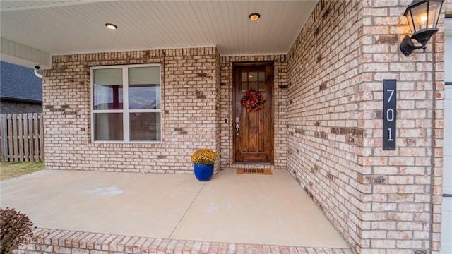 doorway to property featuring a porch