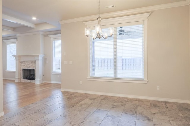 unfurnished dining area featuring a chandelier, light wood-type flooring, and ornamental molding