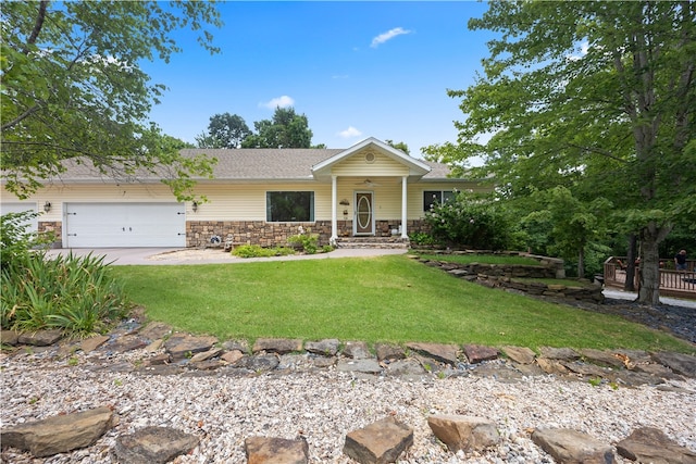 ranch-style home featuring a front yard, roof with shingles, stone siding, and an attached garage