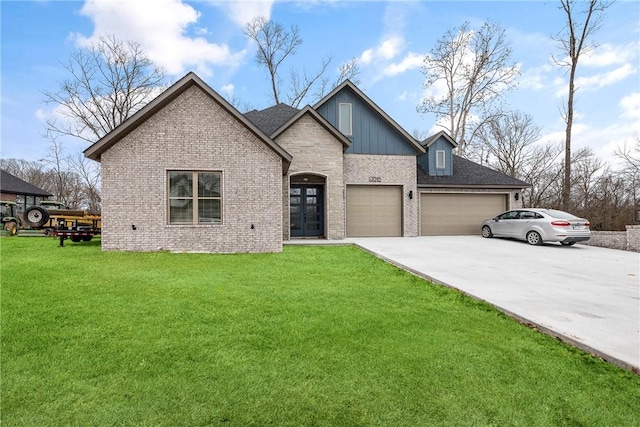 view of front of home featuring french doors, a front yard, and a garage