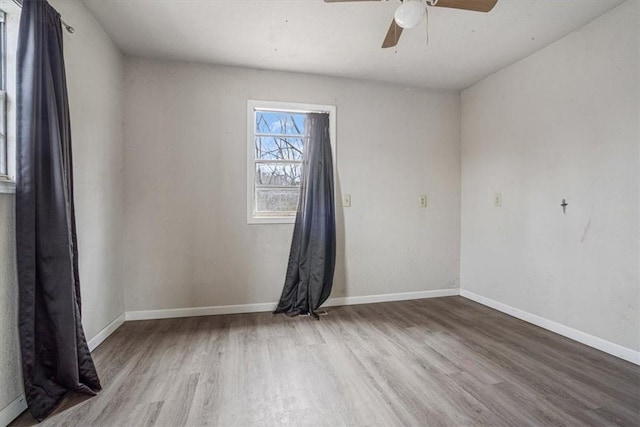 spare room featuring light hardwood / wood-style floors