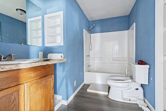 full bathroom featuring shower / bath combination, vanity, wood-type flooring, and toilet