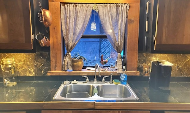 kitchen with decorative backsplash and sink