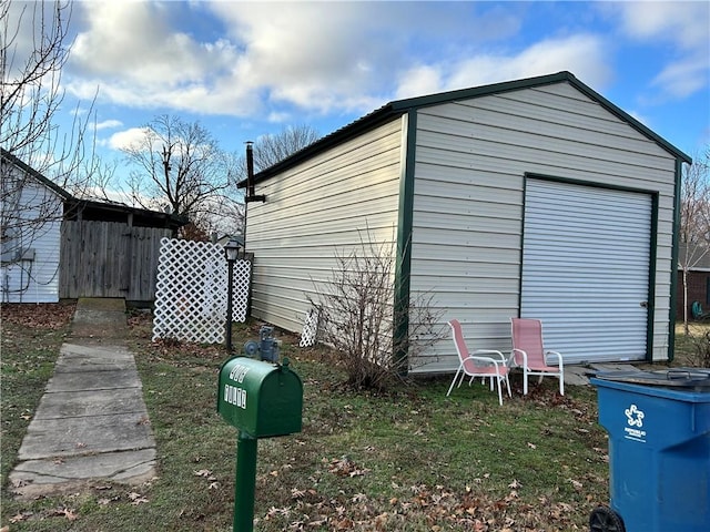 view of outbuilding featuring a garage