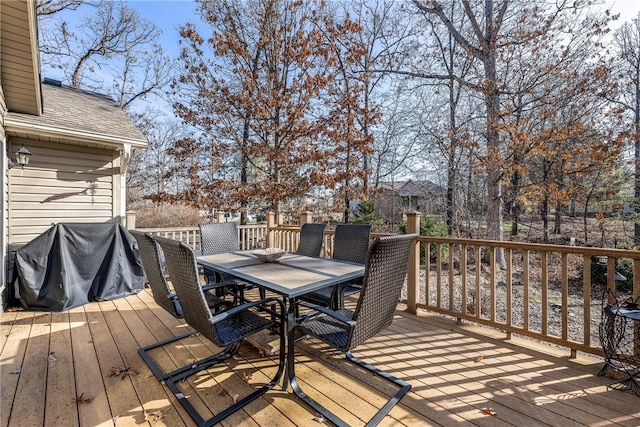 wooden deck with grilling area