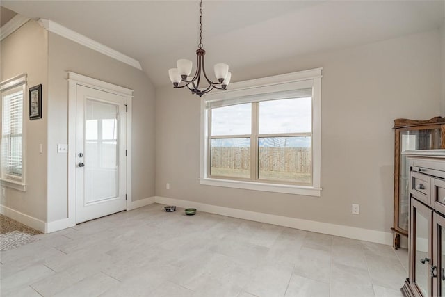 unfurnished dining area featuring a notable chandelier and crown molding