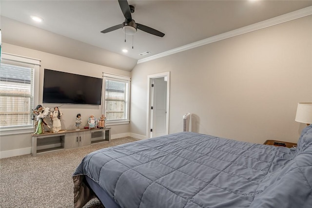 carpeted bedroom with ornamental molding, ceiling fan, and lofted ceiling