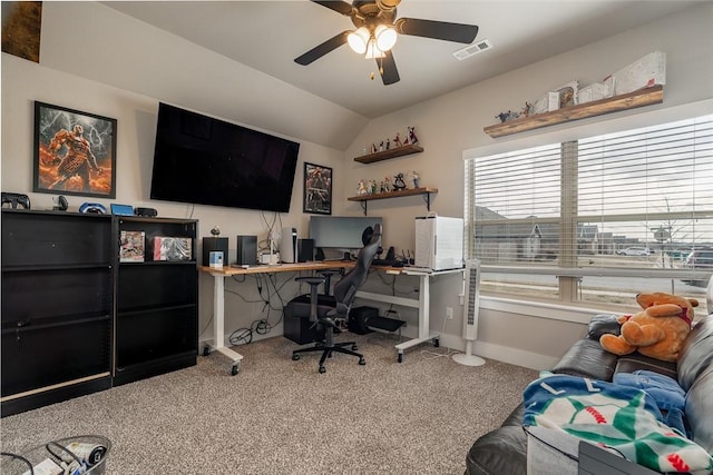 carpeted office featuring ceiling fan and vaulted ceiling