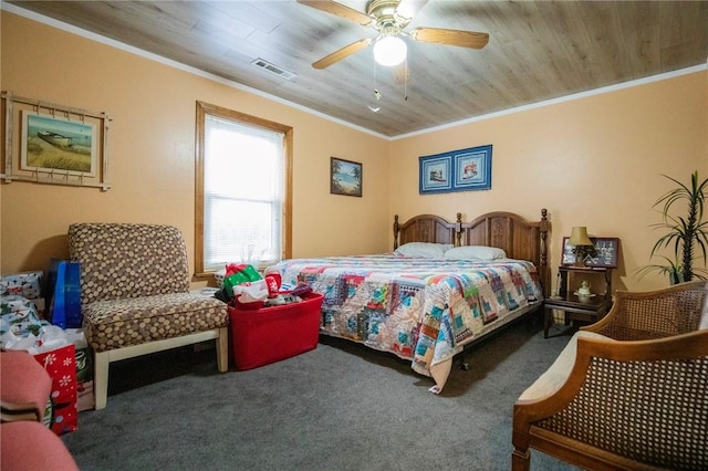 bedroom featuring crown molding, ceiling fan, and carpet flooring