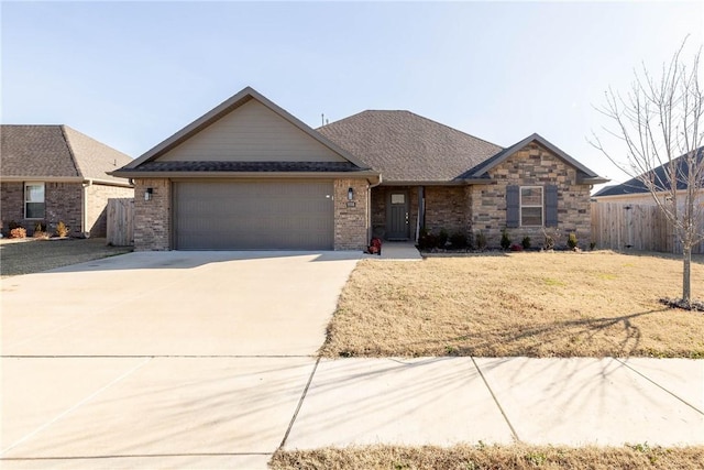 ranch-style house featuring a garage