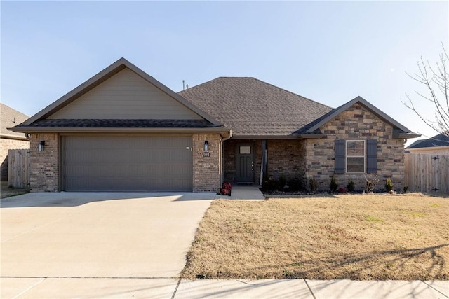 ranch-style house featuring a garage