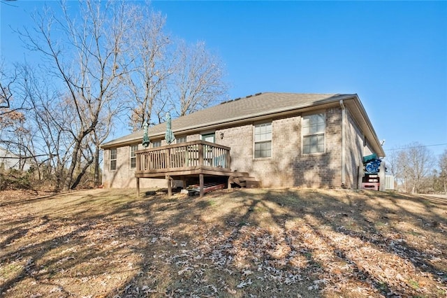 rear view of house with a deck