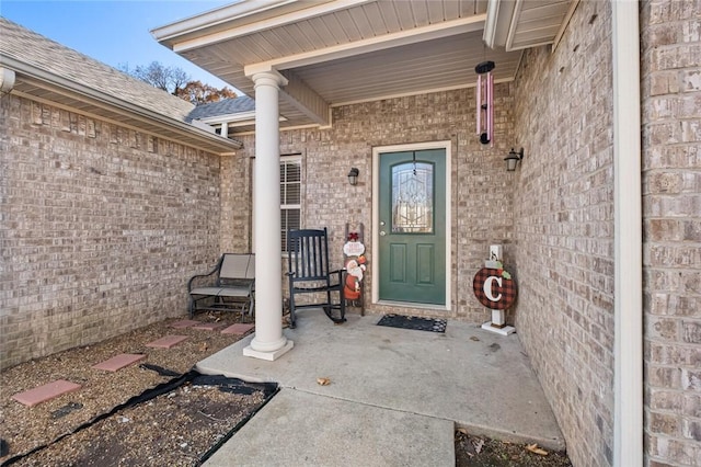 entrance to property with a porch